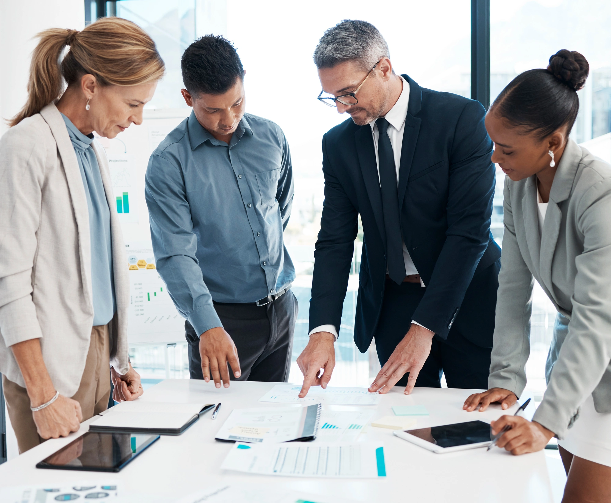 Finance, data and business people working on a graph in a modern office.