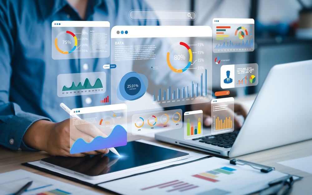 Analyst using computer dashboard for business data analysis