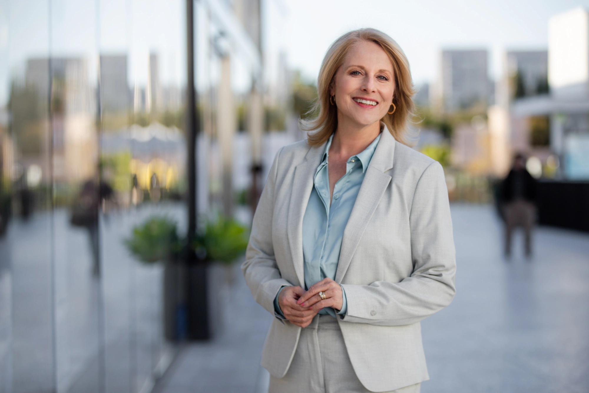 Portrait of an attractive agent smiling, cheerful, proud, successful, elegant and distinguished