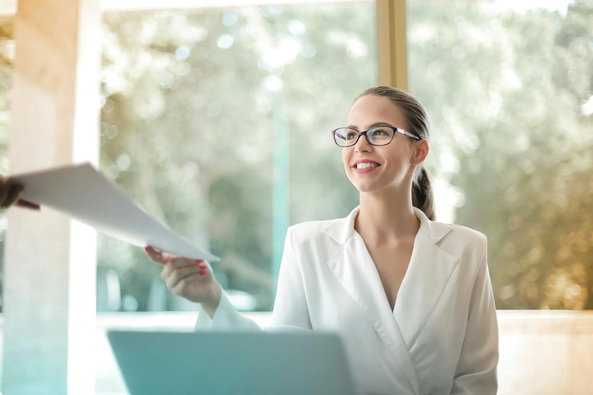 A real estate agent managing daily tasks at their desk