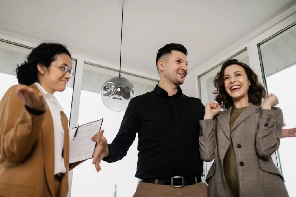 A realtor showing a home to a client