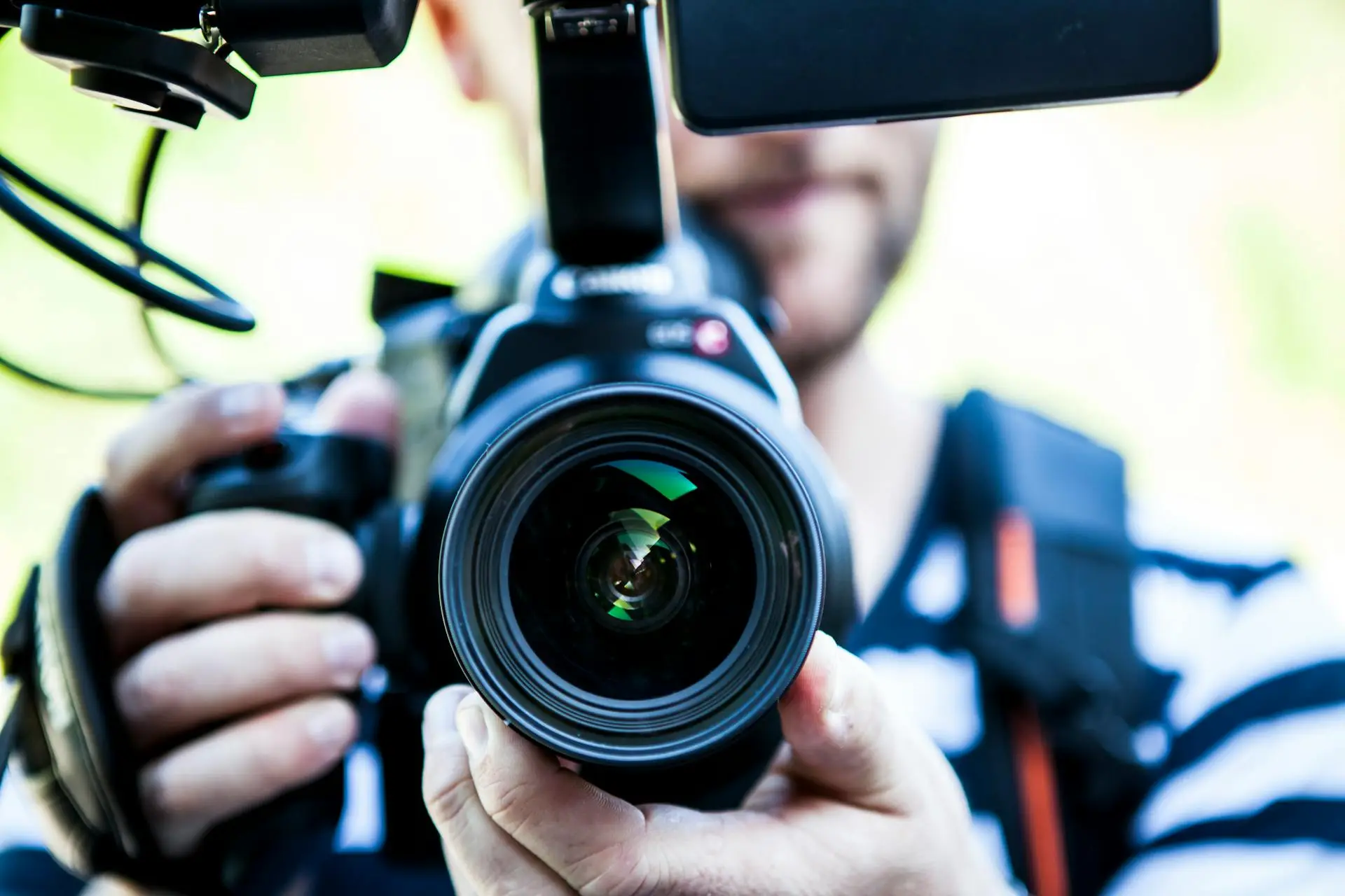 Image of a cameraman preparing for a luxury shoot