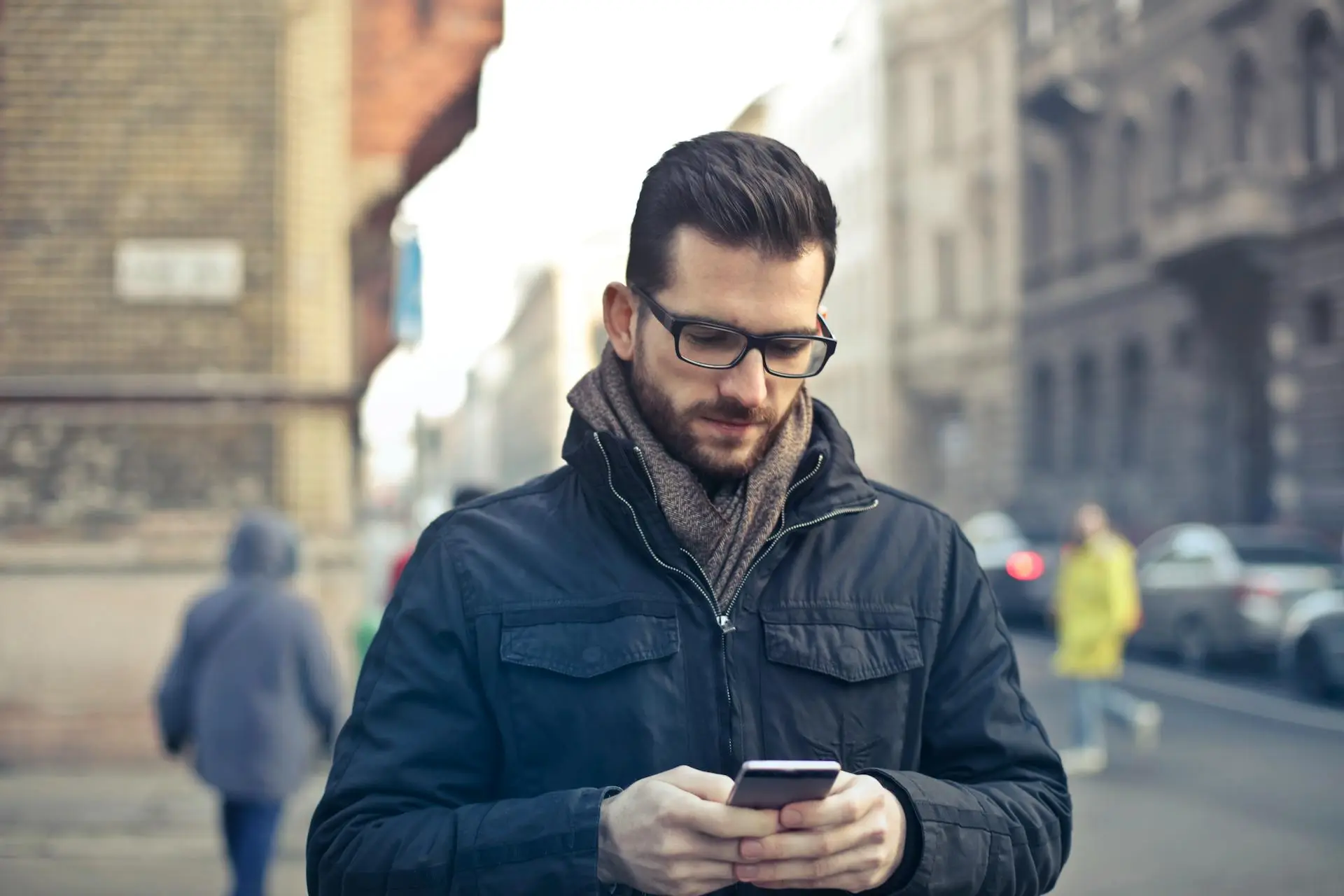 A Realtor looking at their phone with a concerned expression