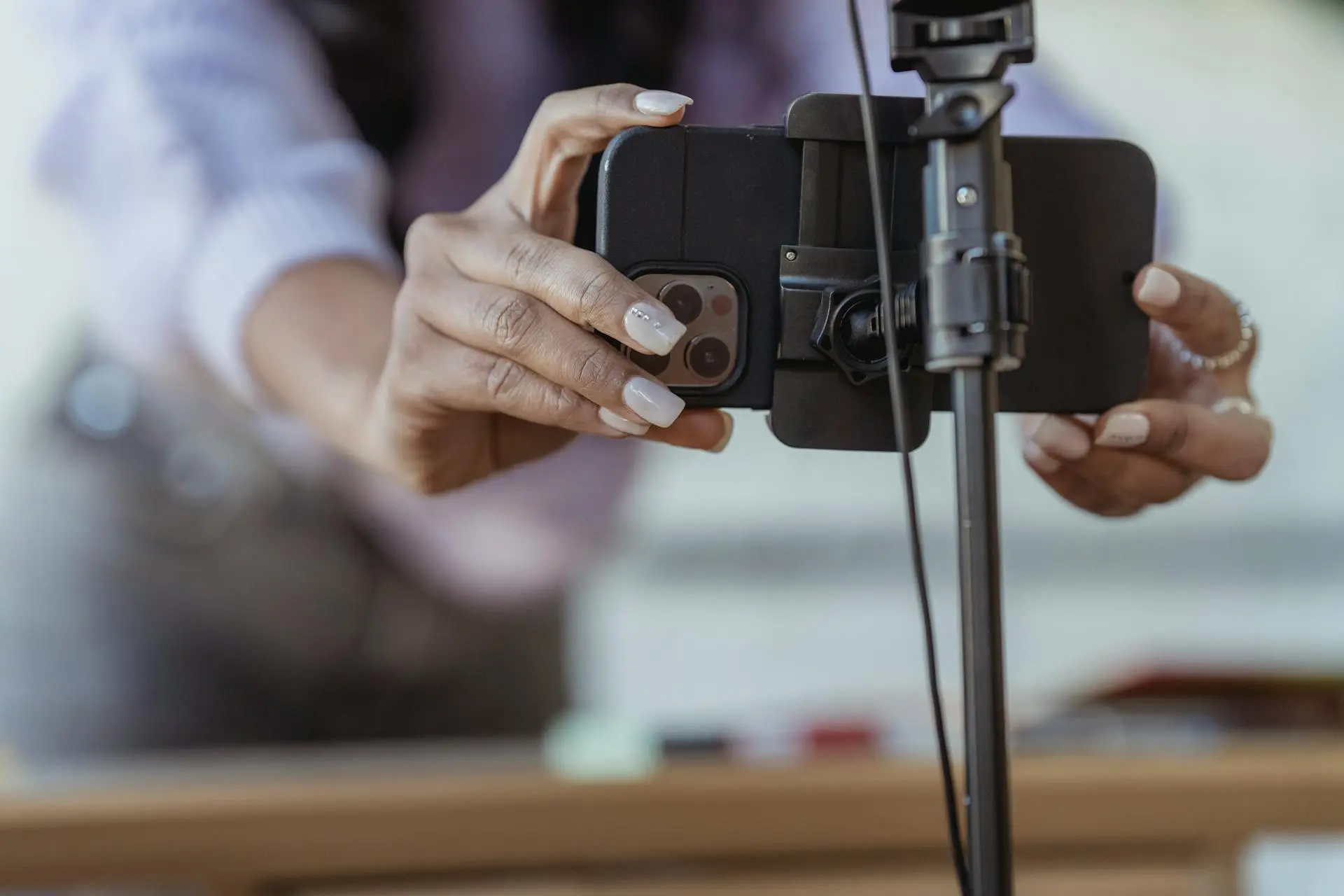 A Realtor recording a professional video tour of a luxury home