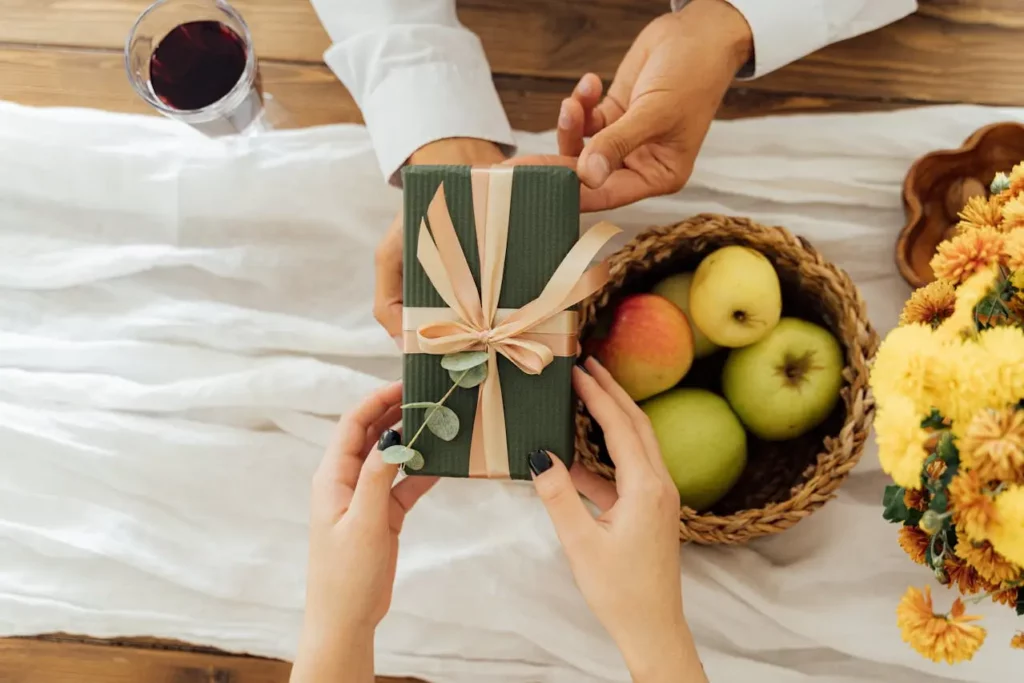 A welcome basket on a kitchen counter for new homeowners