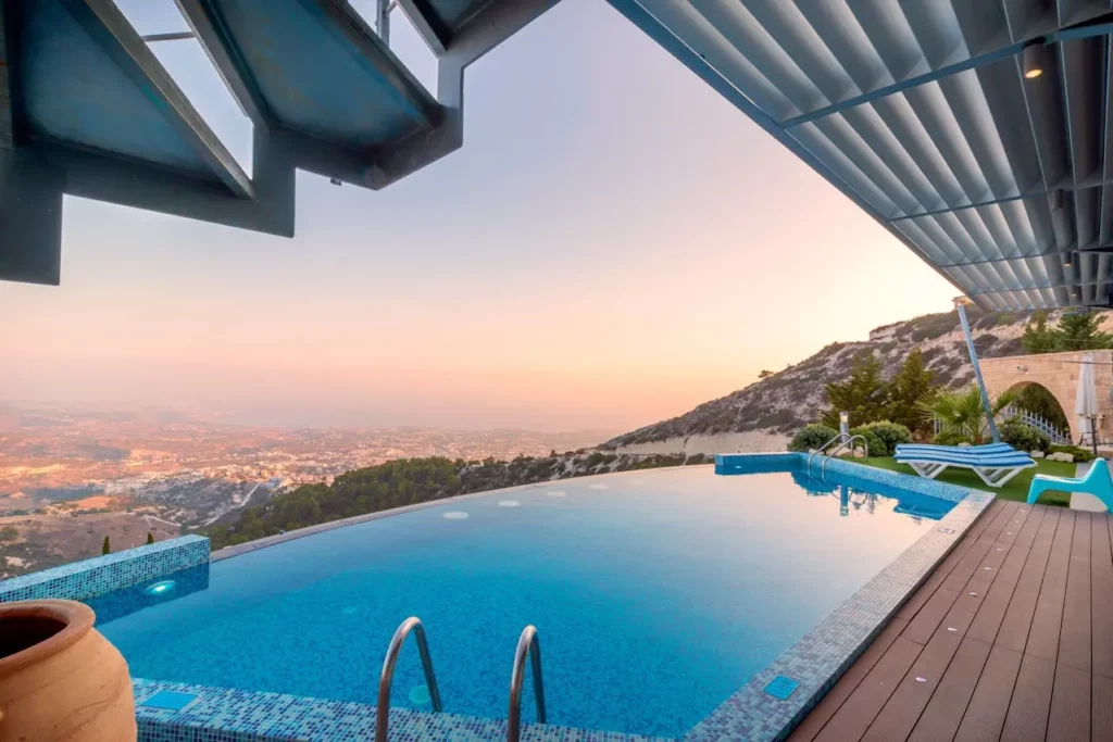 A panoramic view of a luxury home’s infinity pool