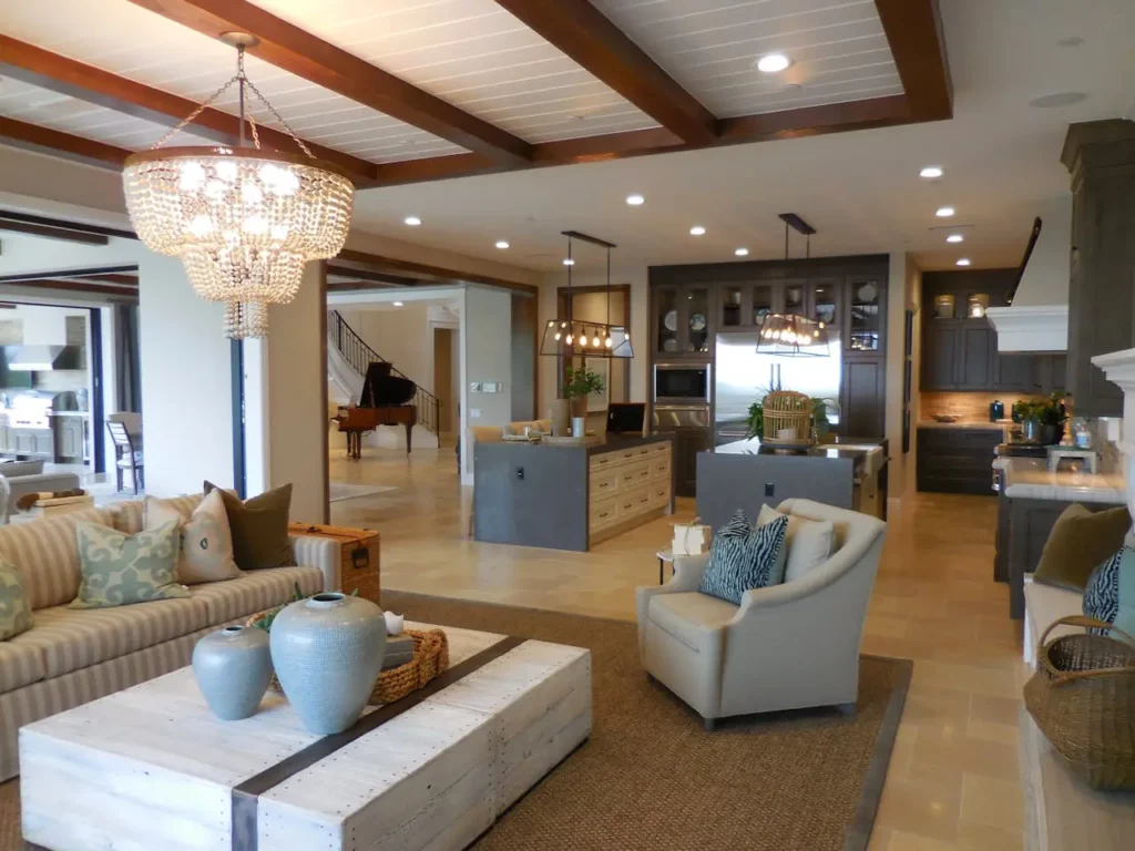 A custom-designed living room with unique chandeliers and bespoke furniture.